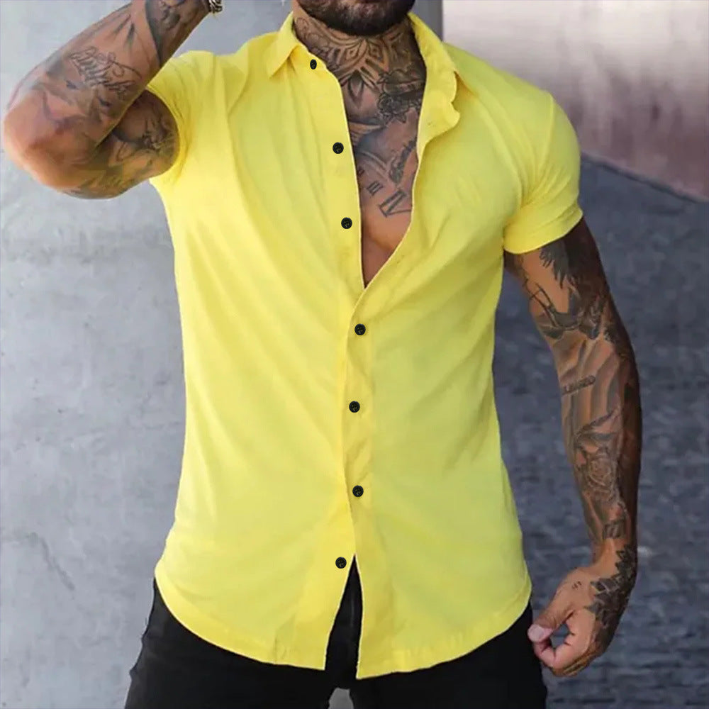 A muscular man in a solid-color lapel short-sleeved shirt