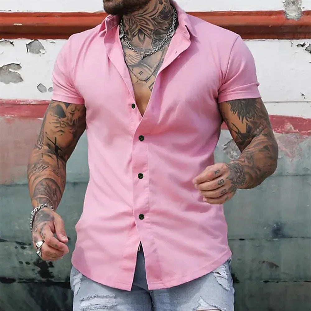 A muscular man in a solid-color lapel short-sleeved shirt